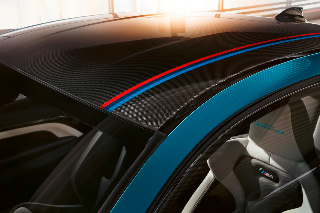 SMALL_[新聞照片二]BMW M4 Edition M Heritage於碳纖維車頂增添M三色飾條，展現BMW M車主的專屬榮耀